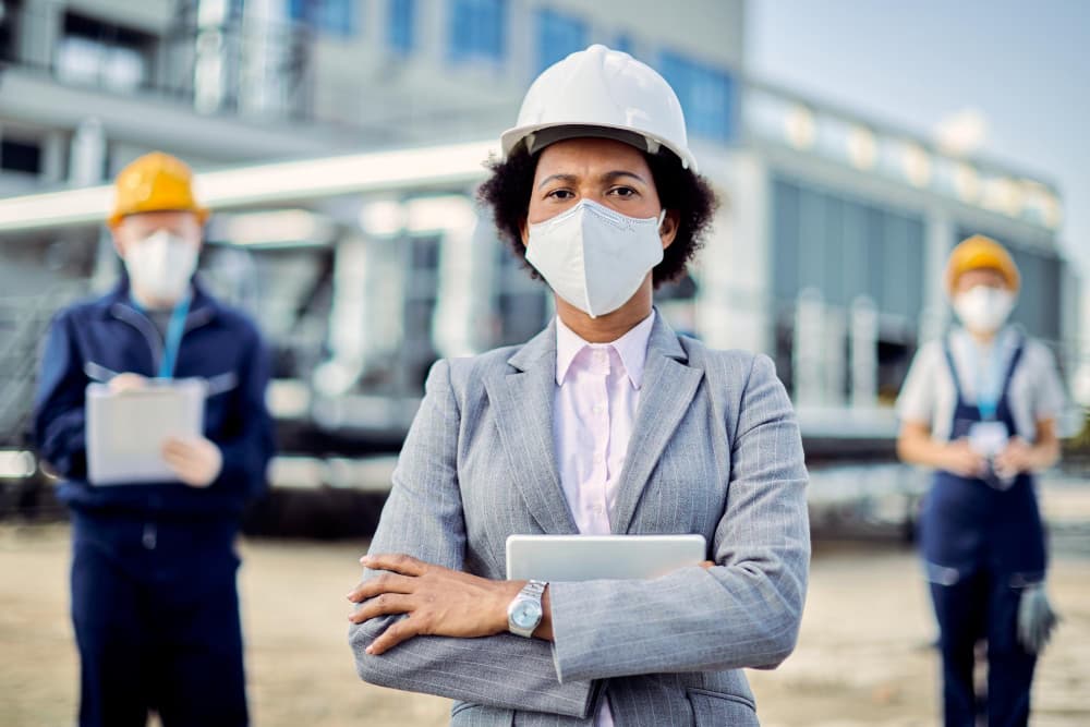 A construction manager leading a multi-site program team